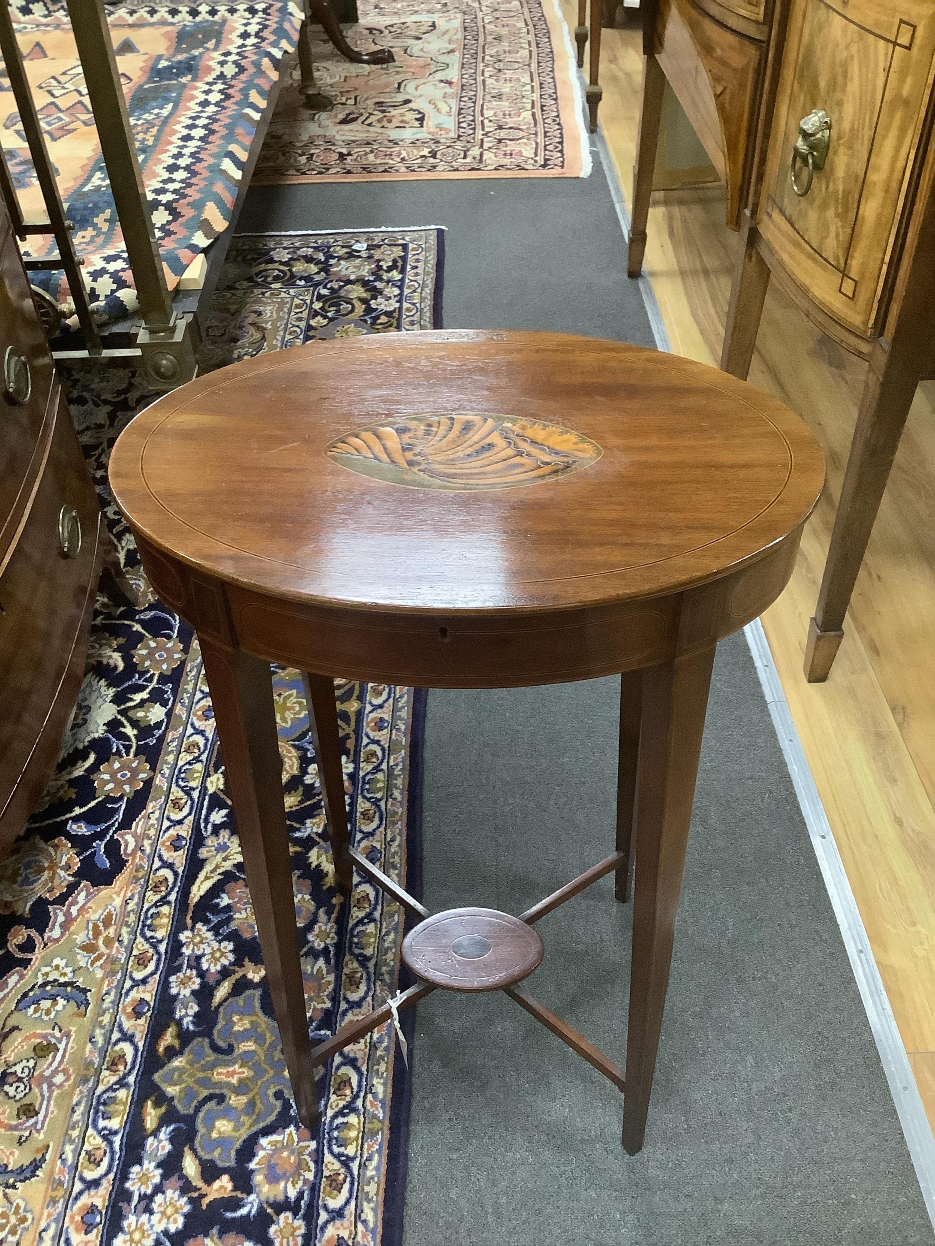 A Sheraton revival shell marquetry inlaid oval work table, width 50cm, depth 34cm, height 76cm. Condition - fair
